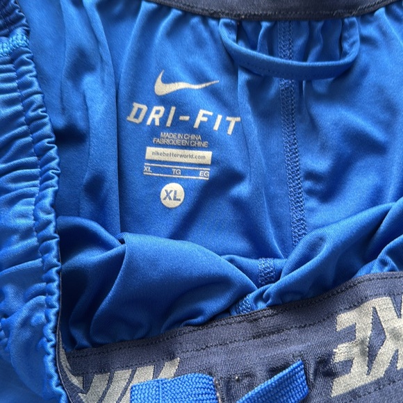 3 pairs of Nike shorts one purple one blue cut offe one flouresant yellow - Picture 4 of 9